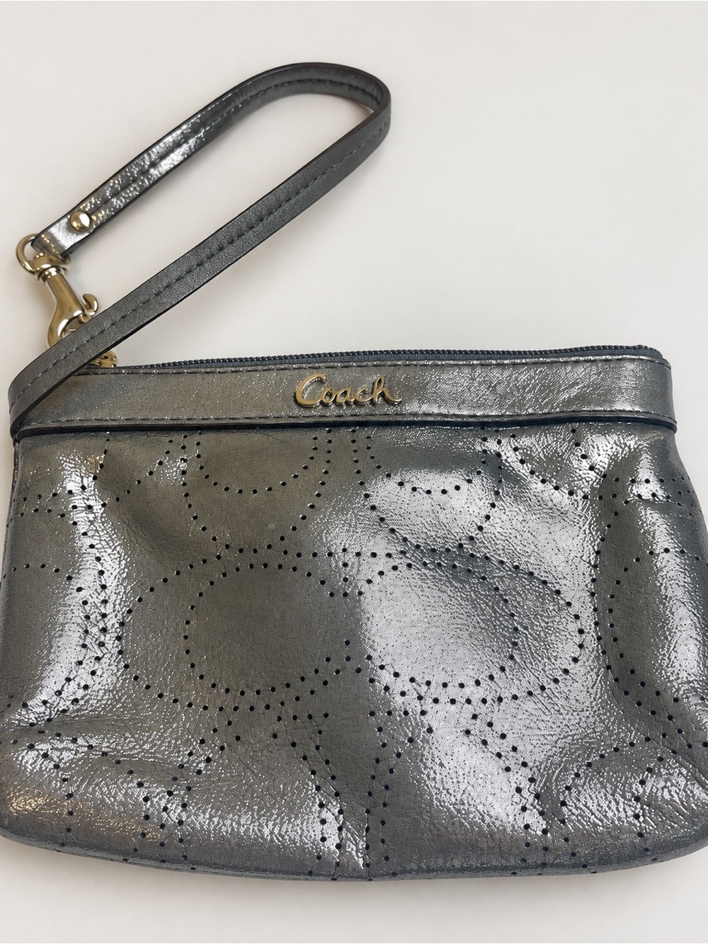 Coach Metallic Silver Wristlet with Perforated Dot Motif